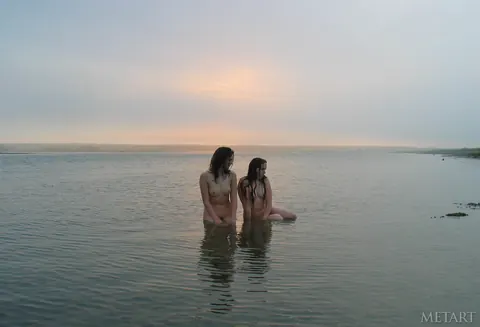 Two Women Kiss Naked on the Beach – photo 10 of 21