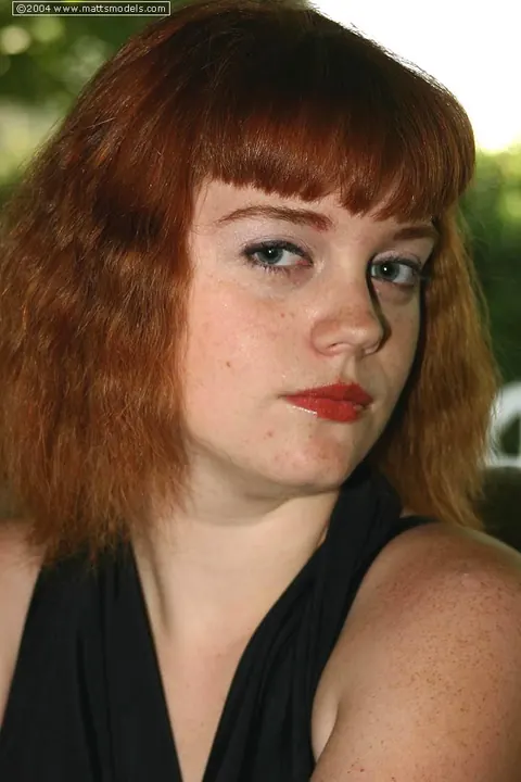 Redhead Cups Her Big Tits While Stripping Out of Her Lingerie – photo 1 of 16