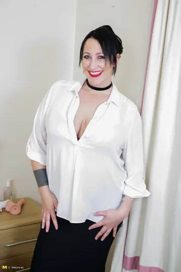 Curvy British MILF in Stockings Fucks a Dildo on the Bed
