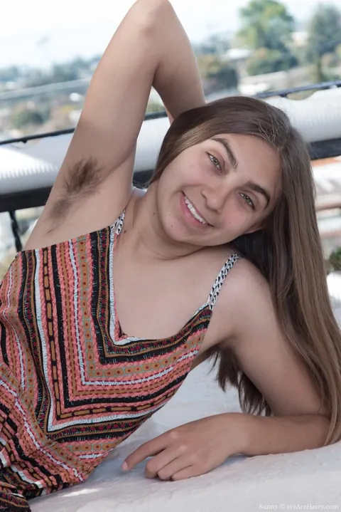 Woman with Hairy Armpits Pulls Panties Aside on the Balcony – photo 2 of 16