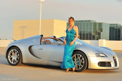 Megan Loxx: Busty Redhead Strips Out of Her Dress in the Car – photo 1 of 20