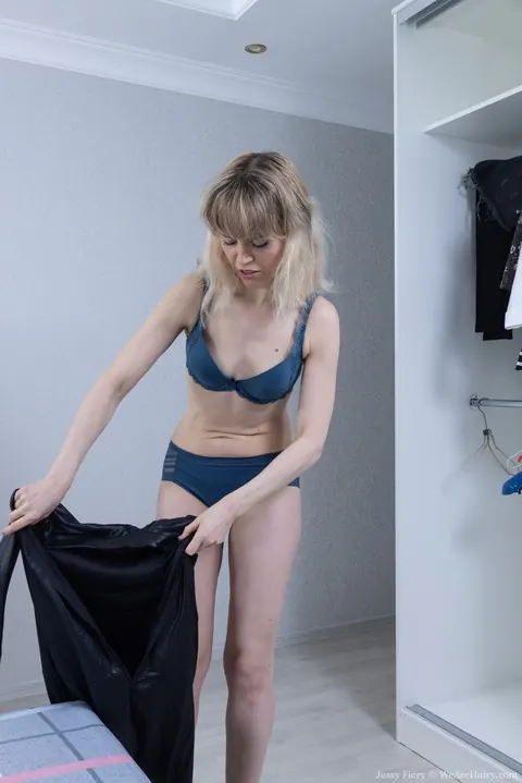 Jessy Fiery: Slim Blonde Undresses and Spreads Her Hairy Bush Wide – photo 3 of 21