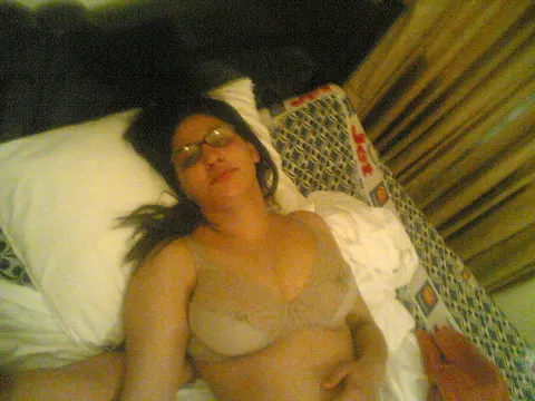 Curvy Indian Woman with Big Tits and Glasses Strips and Poses Nude – photo 8 of 10