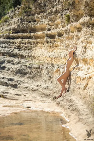 European Blonde with Big Enhanced Tits Strips Out of Her Bikini Outdoors
