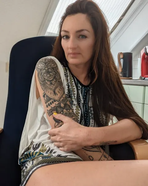 Tattooed Brunette Undresses and Spreads Her Ass – photo 6 of 15