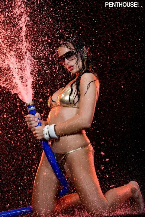 Krista Ayne: Tall Latina in a Bikini and Glasses Poses by the Water Hose – photo 15 of 17