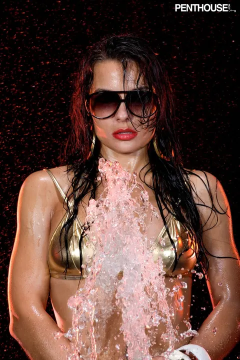 Krista Ayne: Tall Latina in a Bikini and Glasses Poses by the Water Hose – photo 4 of 17