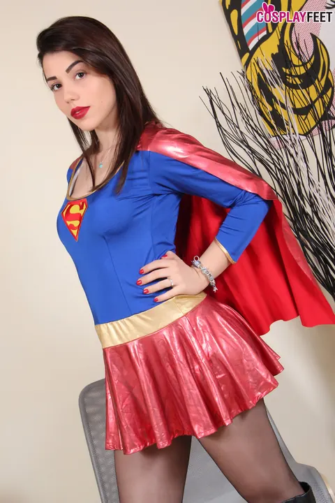 Brunette in Superman Costume Shows Her Pantyhose Feet – photo 3 of 10