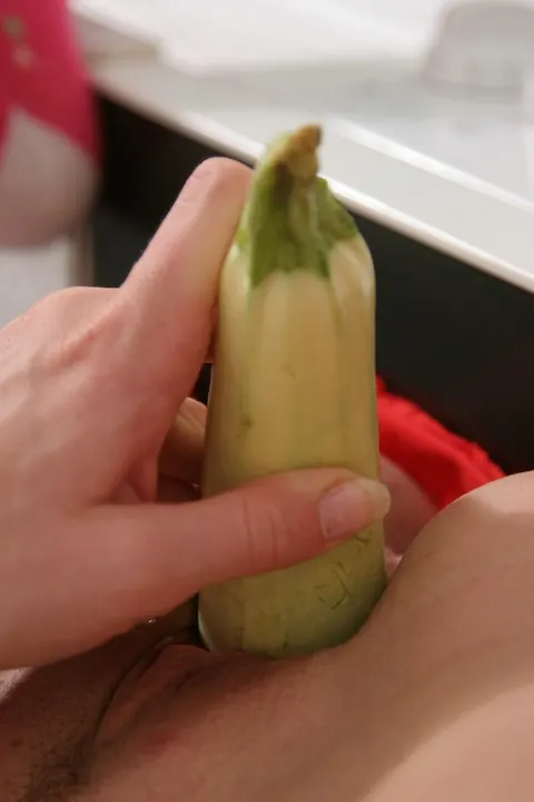 Woman Uses Zucchini to Penetrate Her Pussy and Asshole – photo 15 of 21