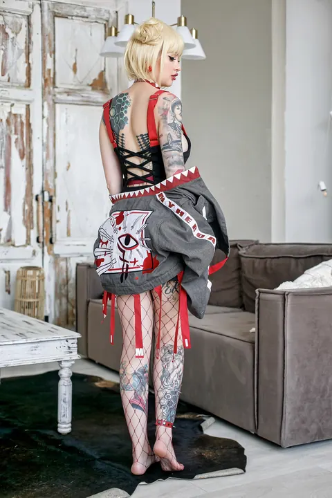 Skinny Tattooed Babe Poses in a Bikini and Costume – photo 18 of 20