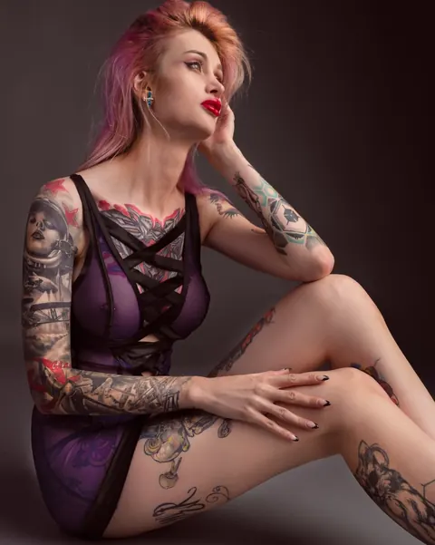 Skinny Tattooed Babe Poses in a Bikini and Costume – photo 7 of 20