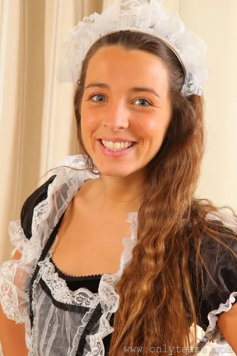 Brunette Sheds Her Maid Uniform and Poses in Stockings – photo 1 of 21