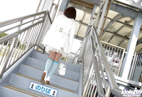 Taeko: Japanese Brunette Flashes Her Tits in a Skirt Outdoors – photo 12 of 15