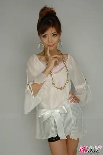Japanese Redhead MILF Poses in Shorts and Heels