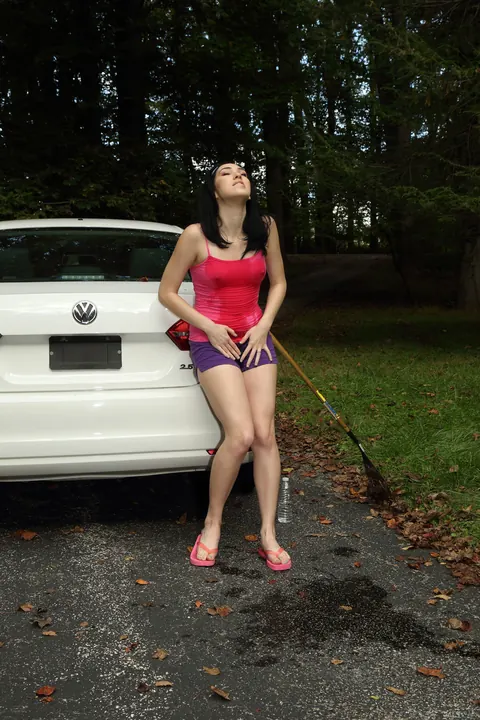 Aria Alexander: Brunette Spreads Her Shaved Pussy and Fingers Her Ass Outdoors – photo 2 of 21