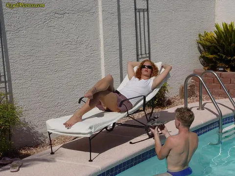 Slim Redhead Shows Her Feet in a Skirt by the Pool – photo 9 of 9