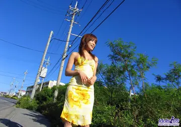 Slim Japanese MILF Lifts Her Skirt and Shows Her Big Tits on the Beach