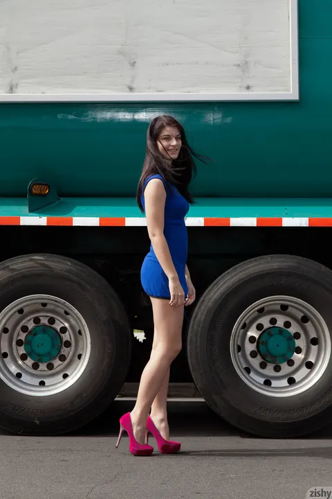 Alyson Grey: Thick Brunette Flaunts Her Curves in a Blue Dress and Heels Outdoors – photo 5 of 12