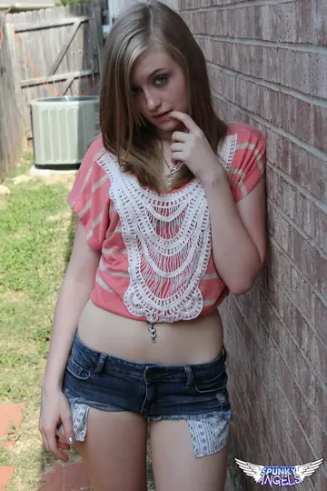 Blonde in Lingerie and Shorts Strips to Show Her Natural Tits