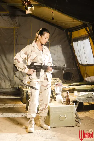 Filipina in an Army Uniform Teases Her Big Tits
