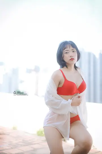 Thick Asian Brunette Poses in Lingerie and a Costume