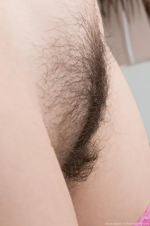 Slava Sanina: Thick Ukrainian Brunette Fingers Her Hairy Pussy in the Kitchen – photo 6 of 21