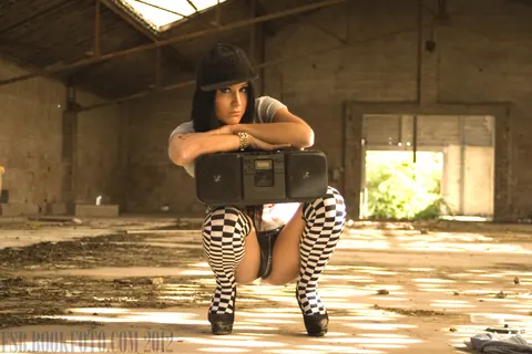 Petite Brunette Poses in Booty Shorts and Heels – photo 19 of 21