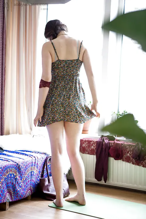 Thick Brunette Pulls Up Panties and Slips into a Dress Over Lingerie – photo 12 of 16
