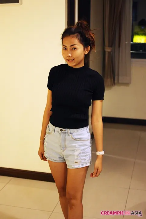 Asian Brunette Shows Off Her Body in Shorts – photo 1 of 16