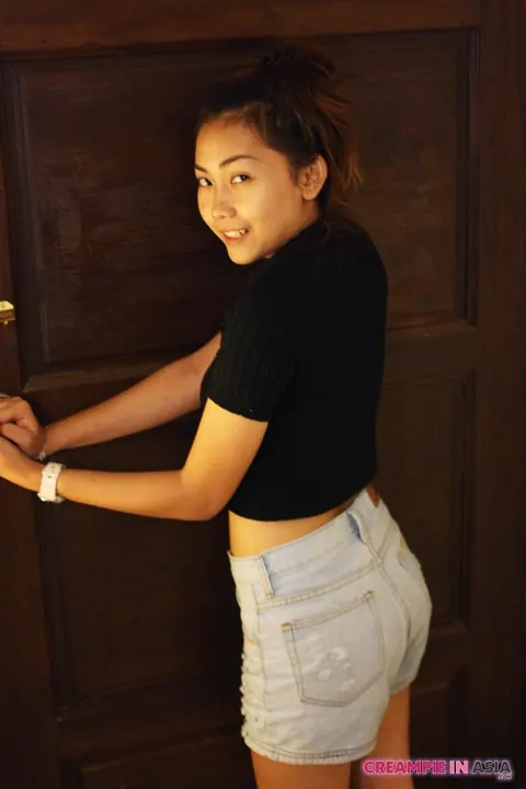 Asian Brunette Shows Off Her Body in Shorts – photo 4 of 16