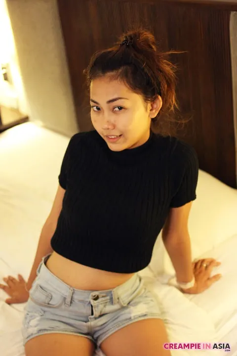 Asian Brunette Shows Off Her Body in Shorts – photo 7 of 16