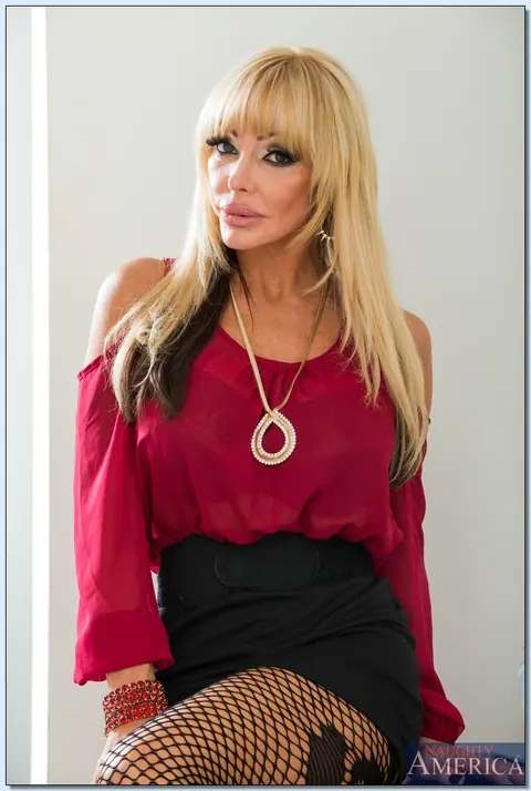Houston: Blonde MILF in Stockings Strips and Poses Nude – photo 2 of 20