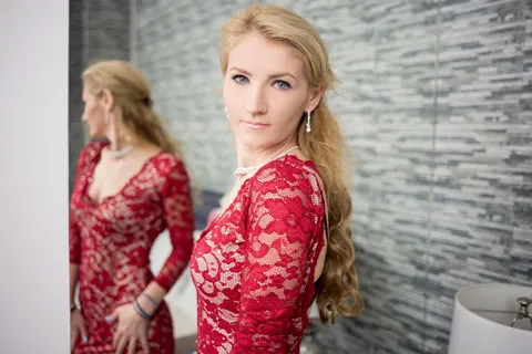 Blonde in a Tight Dress and High Heels Poses Standing – photo 4 of 12