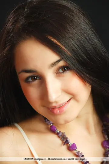 European Brunette with Big Tits Spreads on Orange Sofa