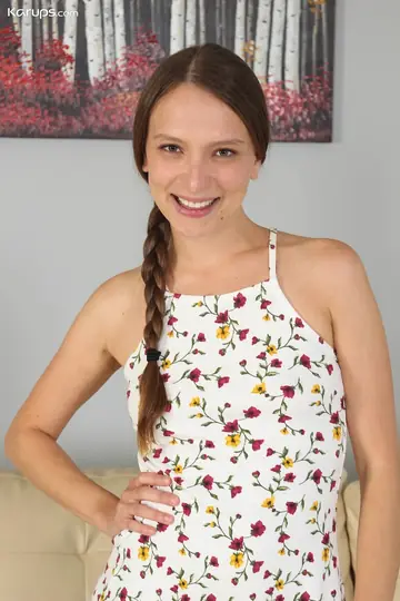 Brunette in a Skirt and Panties Spreads Her Trimmed Pussy