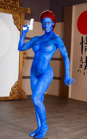 Redhead in Body Paint Shows Off Her Enhanced Tits and Spreads