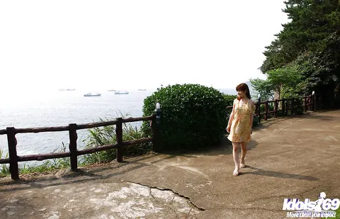 An Nanba: Japanese Brunette in a Skirt Strips and Spreads Outdoors – photo 13 of 14
