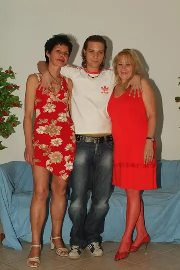 Mature Curvy Blonde in Stockings Enjoys a Threesome