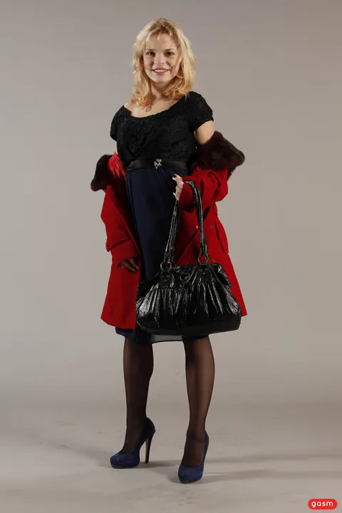 Petite European Blonde Poses in a Skirt and High Heels – photo 15 of 15