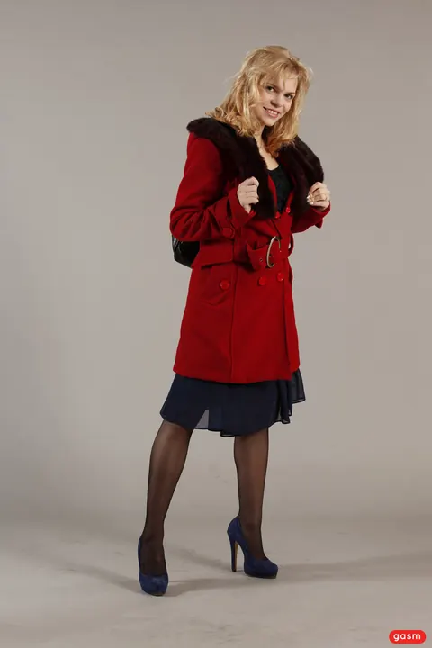 Petite European Blonde Poses in a Skirt and High Heels – photo 6 of 15