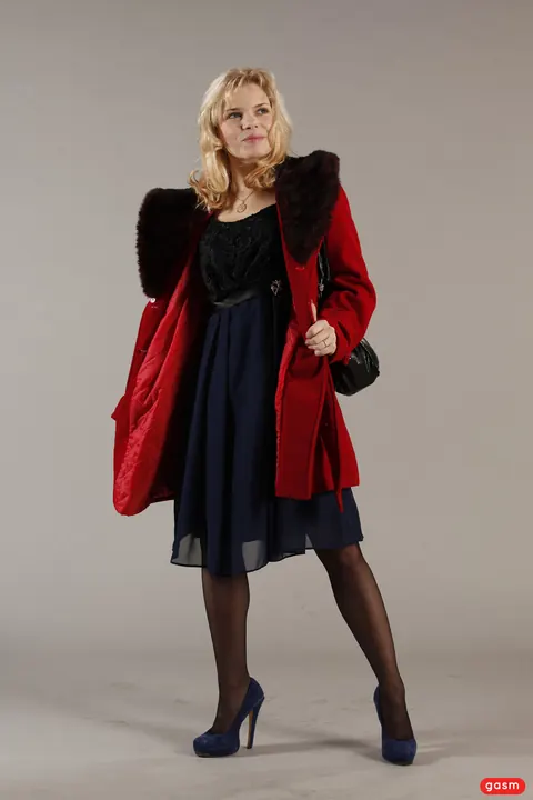 Petite European Blonde Poses in a Skirt and High Heels – photo 12 of 15