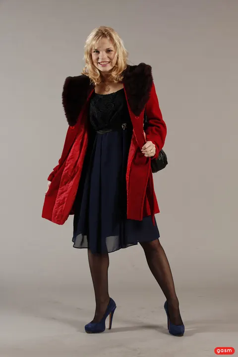 Petite European Blonde Poses in a Skirt and High Heels – photo 11 of 15