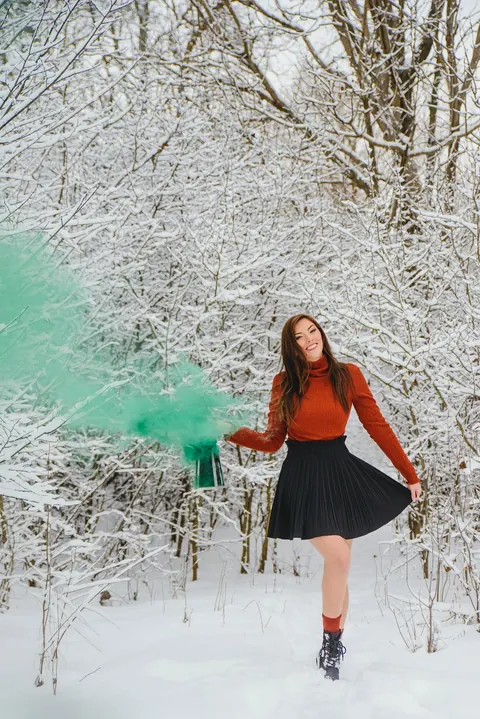 Redhead Lifts Her Skirt Hem Outdoors – photo 4 of 15