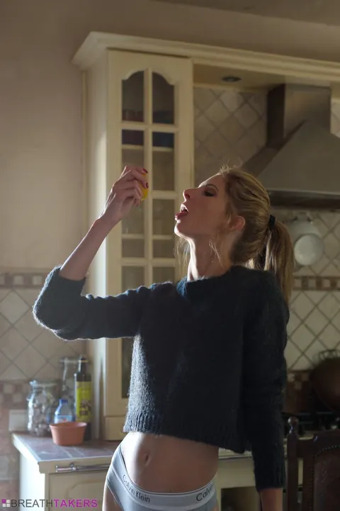 Rebecca Leah: Tall British Blonde in Pigtails Bares Her Big Natural Tits in the Kitchen – photo 4 of 12