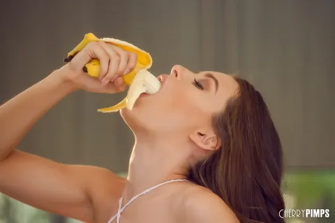 Lana Rhoades: Busty Brunette Eats Banana and Spreads Her Hairy Pussy – photo 6 of 16