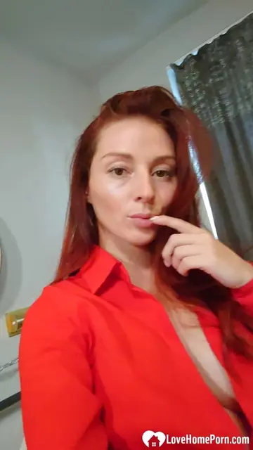 Redhead with Big Enhanced Tits Displays Her Tattoos