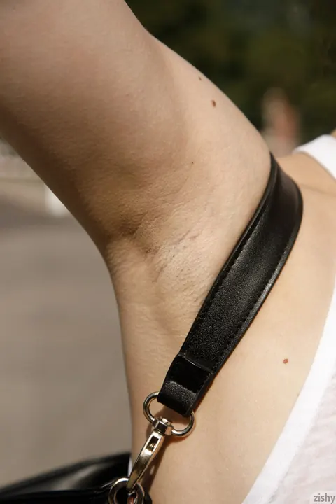 Clara Mabee: Petite Brunette in Boots Flashes Her Tits and Shows Shaved Armpits Outdoors – photo 11 of 12
