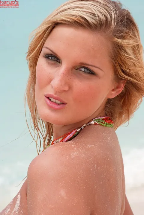 Blonde in Panties Spreads Her Shaved Pussy on the Beach – photo 17 of 21
