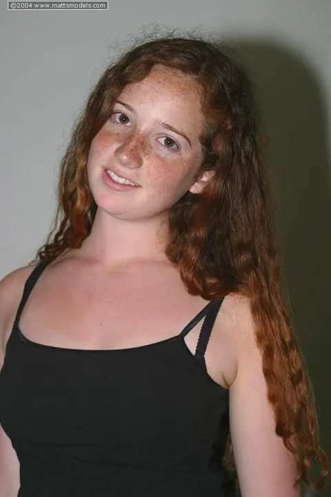 Redhead in Lingerie Pulls Panties Aside to Spread Her Hairy Pussy – photo 3 of 16