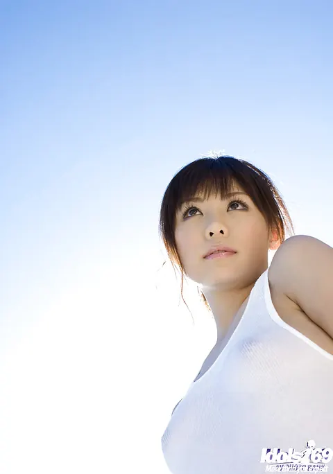 Aya Hirai: Japanese Babe with Big Natural Tits Strips by the Pool – photo 2 of 15